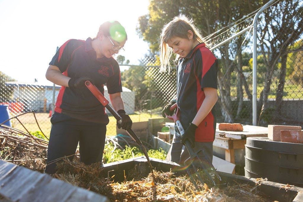 Students gardening in their school garden